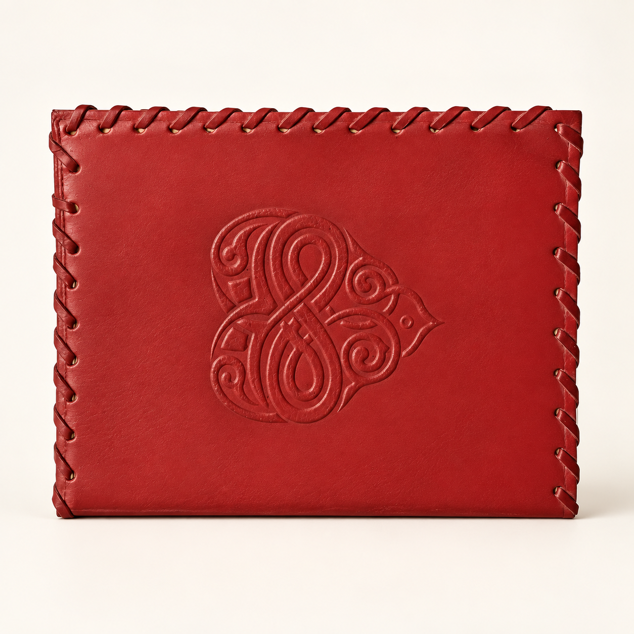 Red handmade paper diary with stitched cover